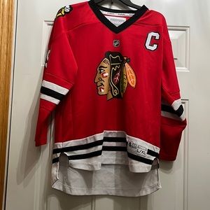 Reebok NHL Blackhawks YOUTH hockey jersey.